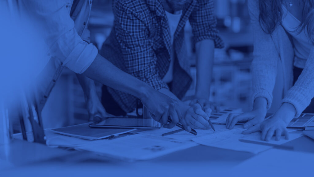 Close up of a coworkers working on a project