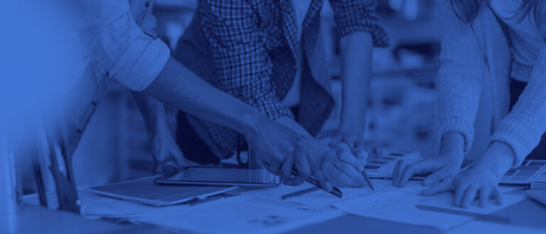 Close up of a coworkers working on a project